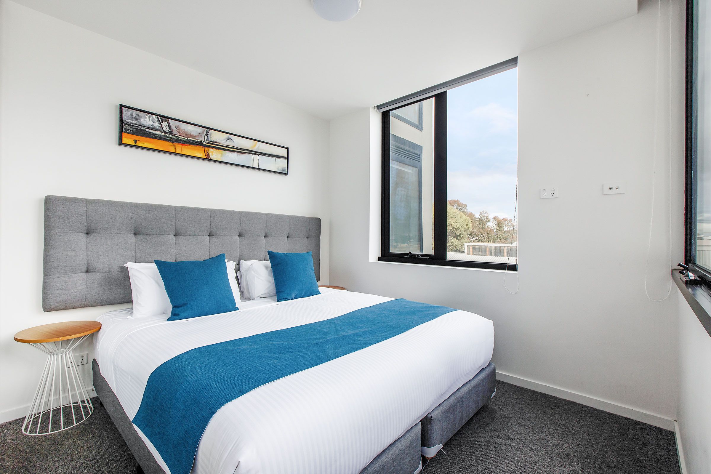 2 Bedroom Deluxe - king bedroom with window