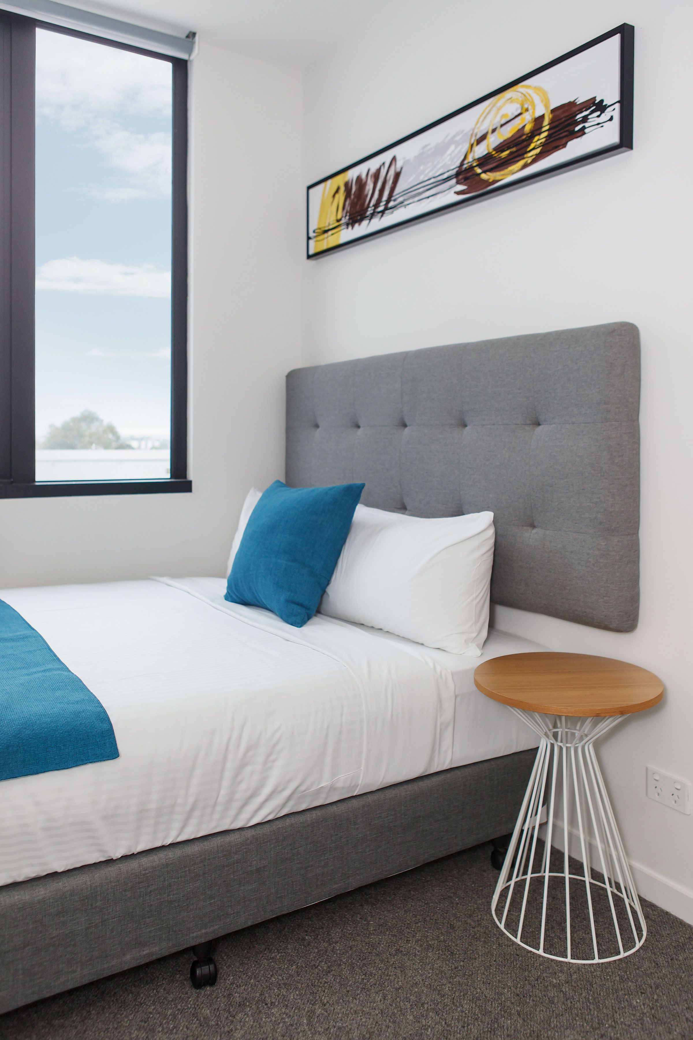 Premium 2 Bedroom - single bedroom with art