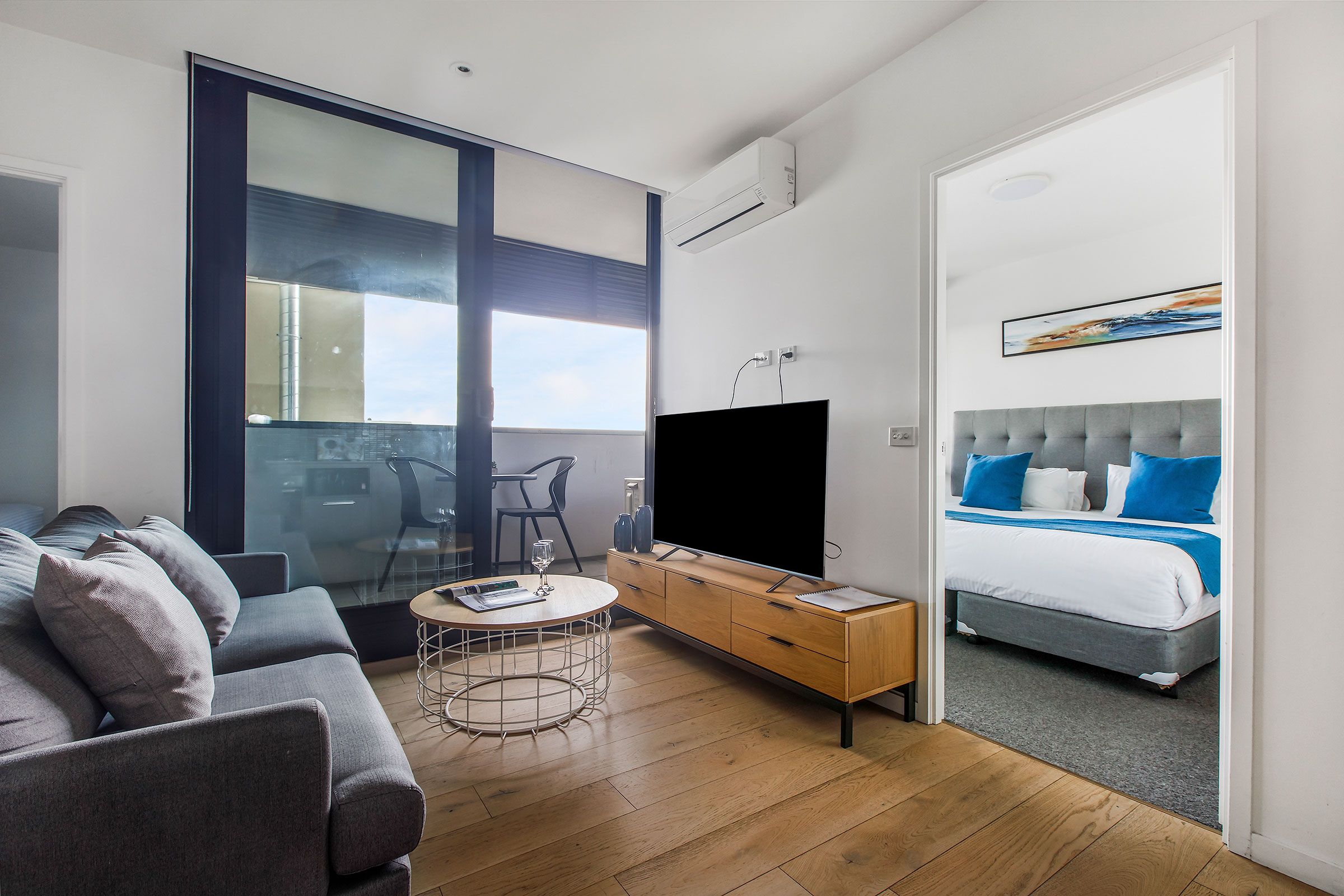 2 Bedroom Standard - lounge with balcony and bedroom